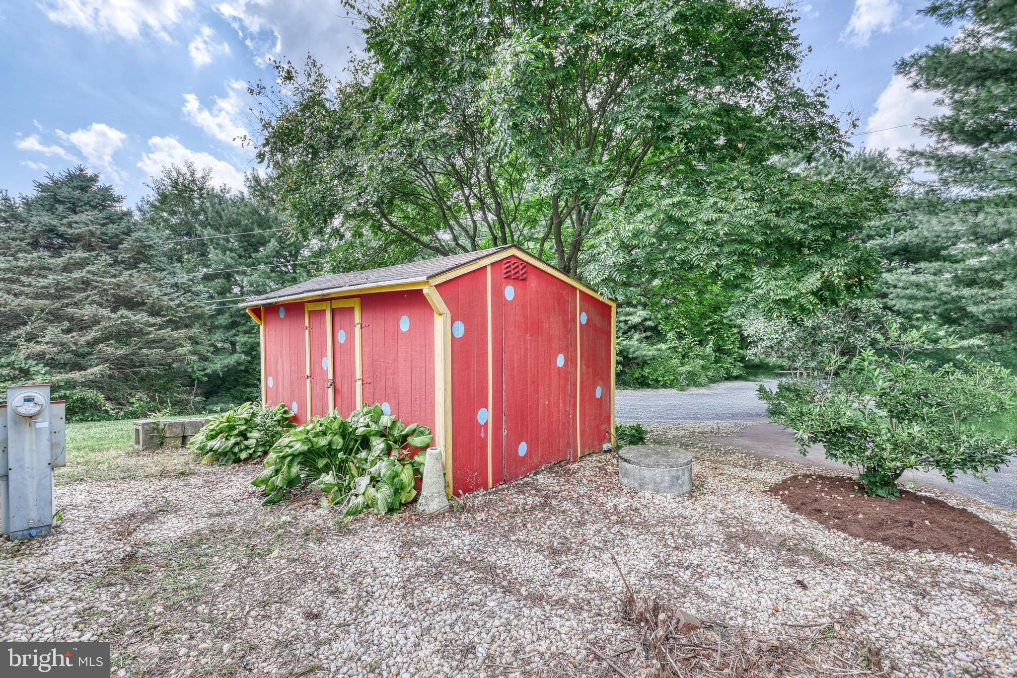 13859 Ebaugh Road Stewartstown, PA 17363 - Photo 36 of 61 a view of a backyard with large trees and plants