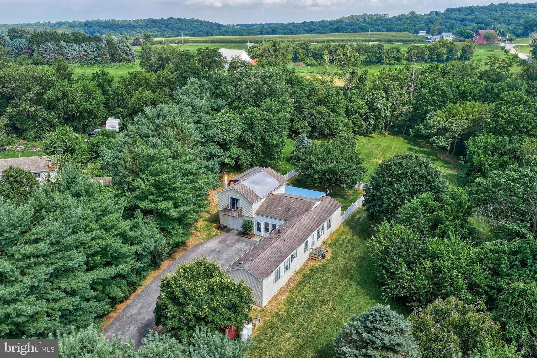 13859 Ebaugh Road Stewartstown, PA 17363 - Photo 40 of 61 an aerial view of a house with a yard