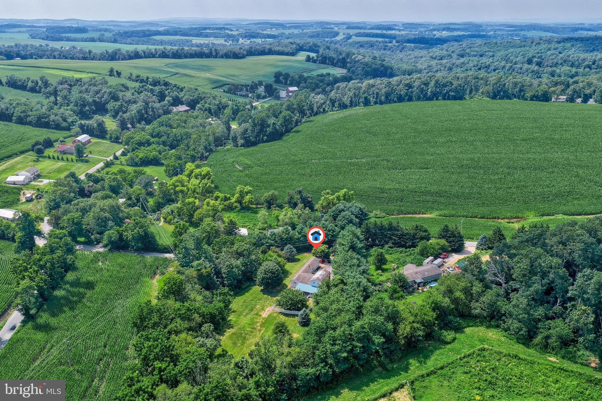 13859 Ebaugh Road Stewartstown, PA 17363 - Photo 46 of 61 a view of a lush green field with lots of bushes