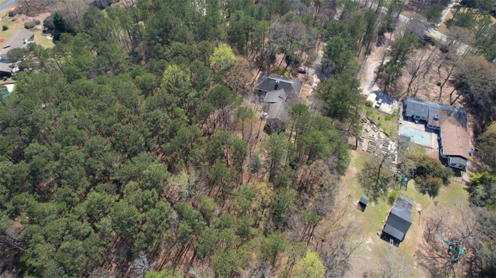 2740 Dennard Road Northeast Conyers, GA 30013 - Photo 51 of 51 an aerial view of residential house with space and trees all around