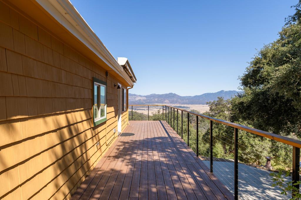 25770 East Grade Road Santa Ysabel, CA 92070 - Photo 8 of 75 a view of balcony with wooden floor and fence