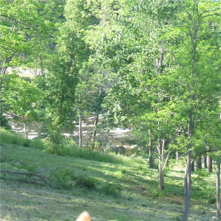 Lot 20 Haystack Road, Unit 20 Waynesville, NC 28785 - Photo 9 of 23 a big yard with lots of green space and plants