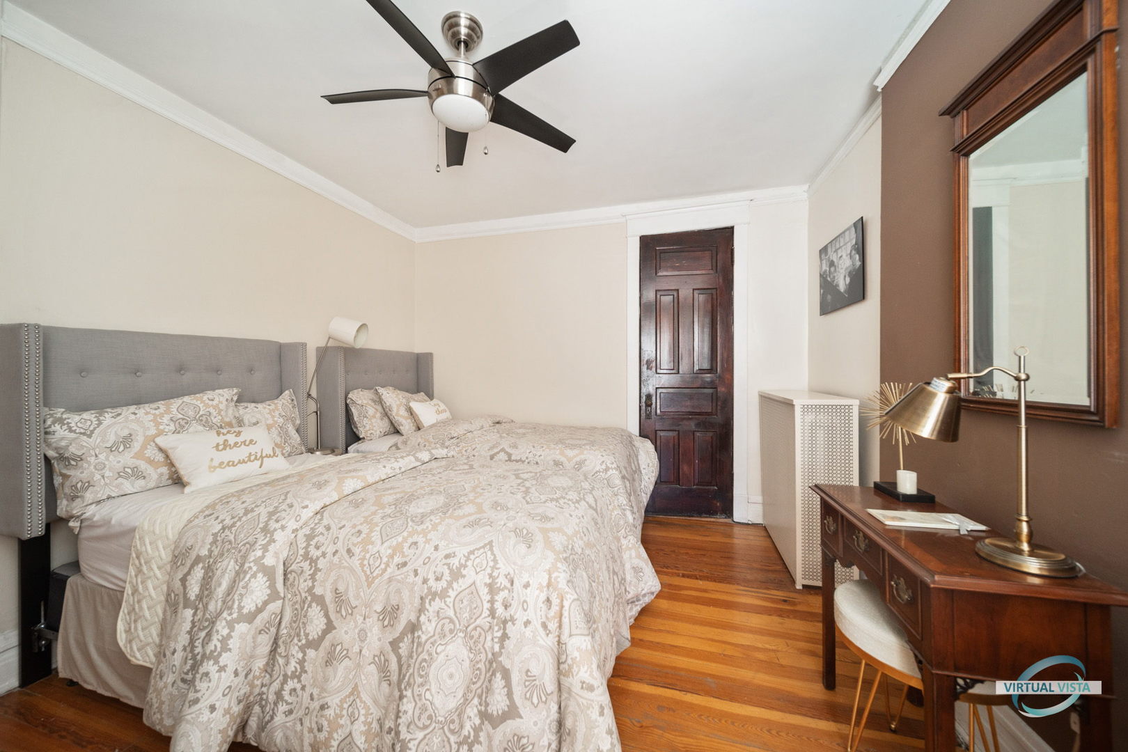 1529 East Marquette Road Chicago, IL 60637 - Photo 14 of 37 a bed room with a bed and a chandelier