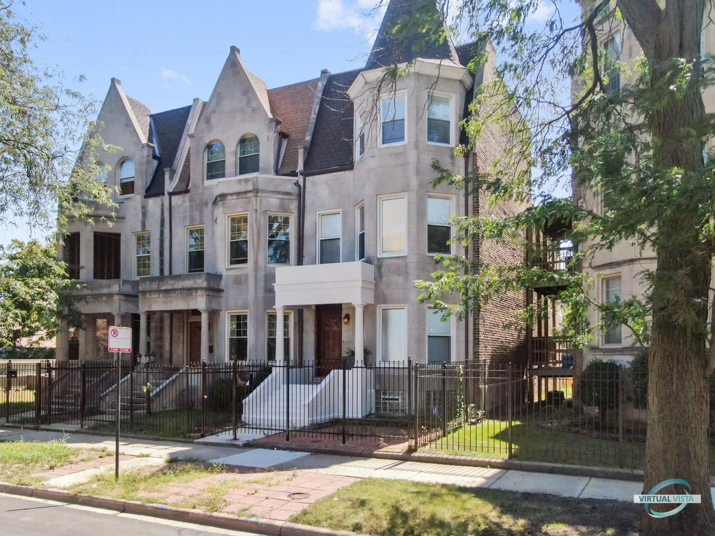 1529 East Marquette Road Chicago, IL 60637 - Photo 2 of 37 a front view of a house with a yard