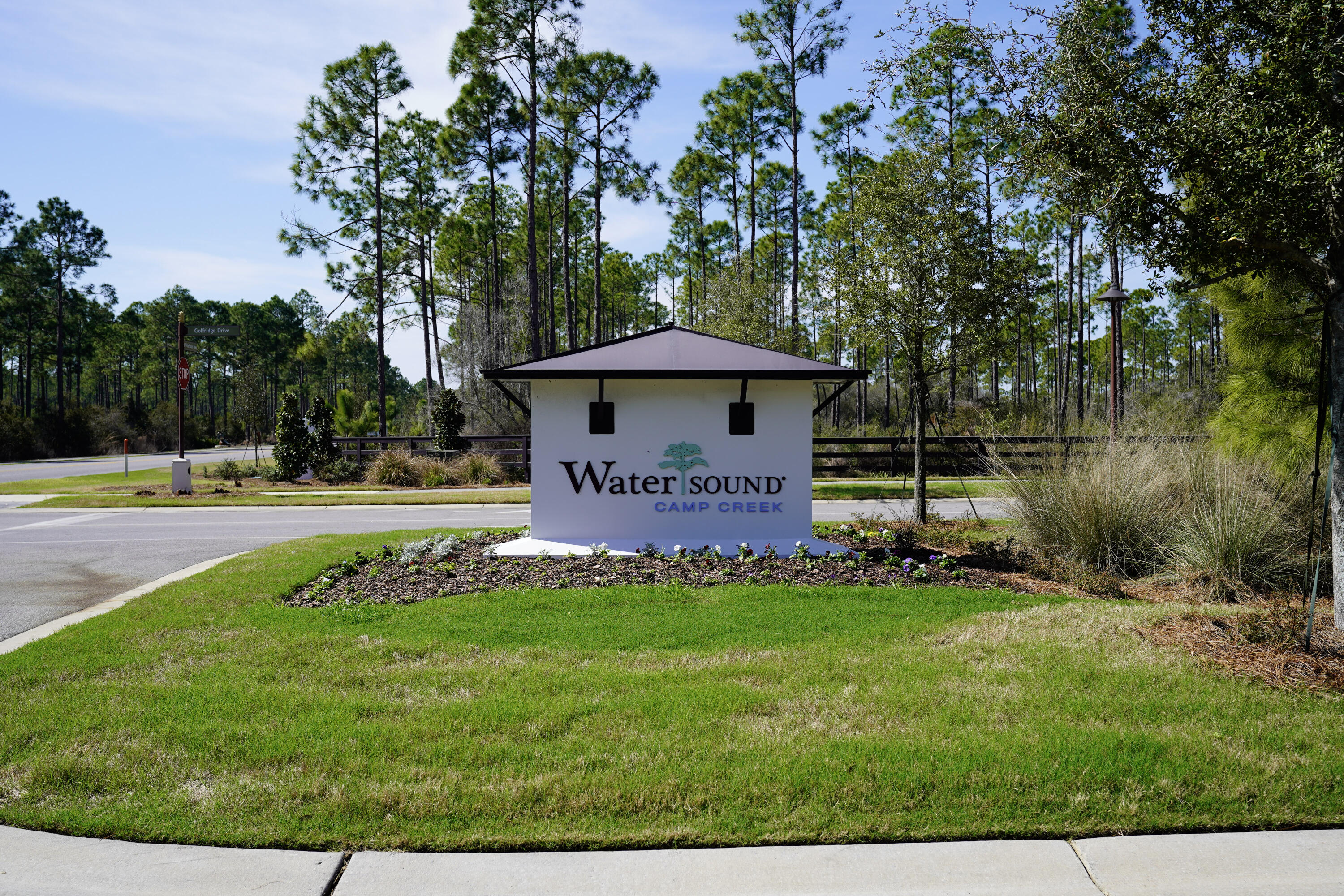 Lot 234 Quail Hollow Inlet Beach, FL 32461 - Photo 20 of 24 a front view of a house with garden