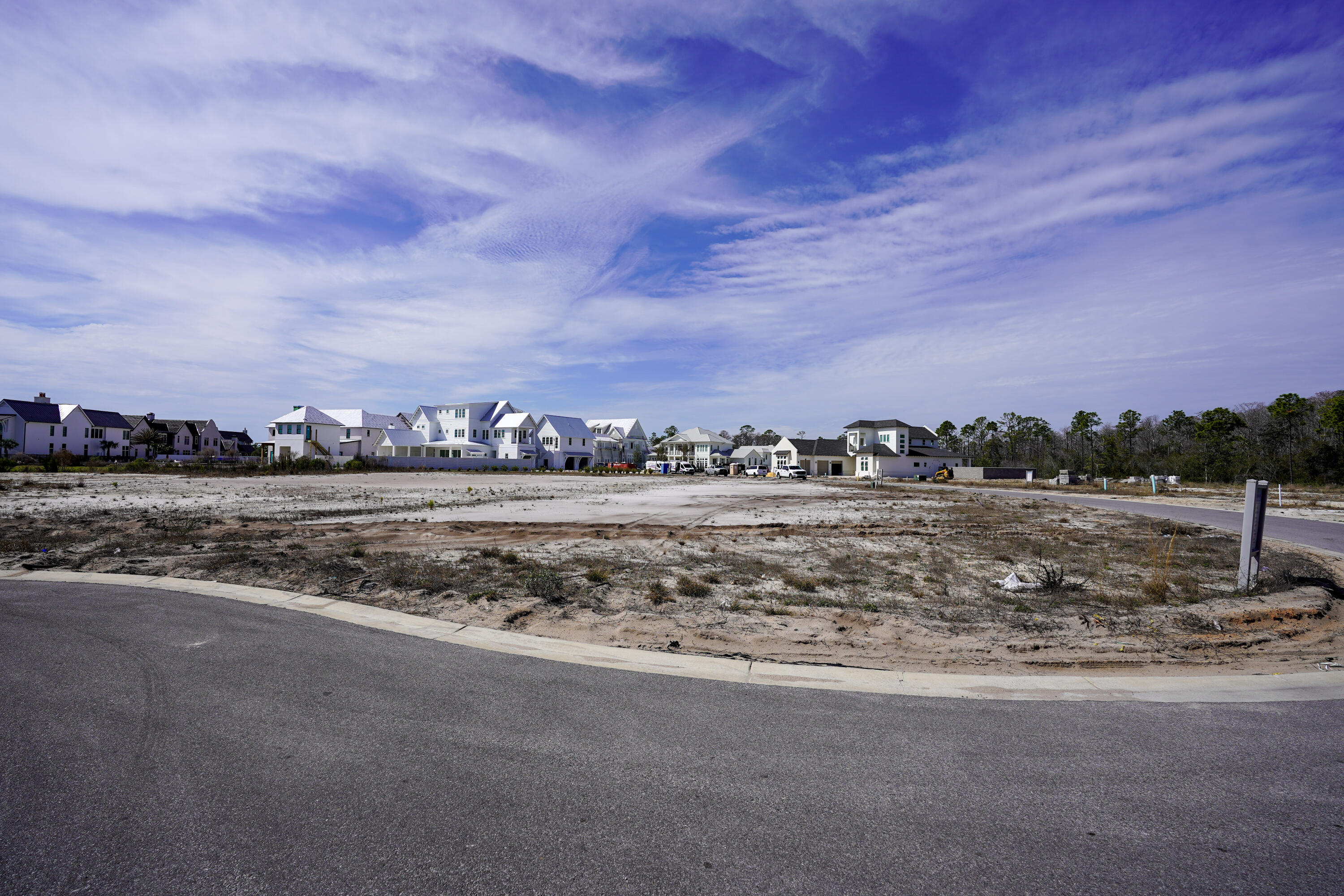Lot 234 Quail Hollow Inlet Beach, FL 32461 - Photo 22 of 24 a view of a lake with houses in the back