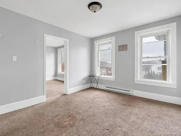 an empty room with windows