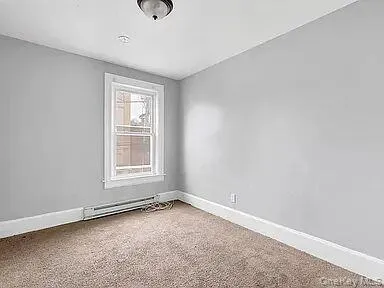 an empty room with a window