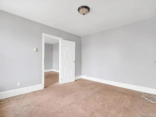 an empty room with an entryway