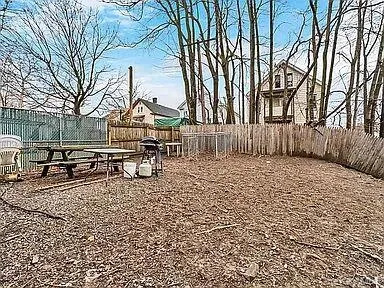 a bench sitting in front of a building