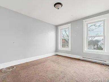 an empty room with windows