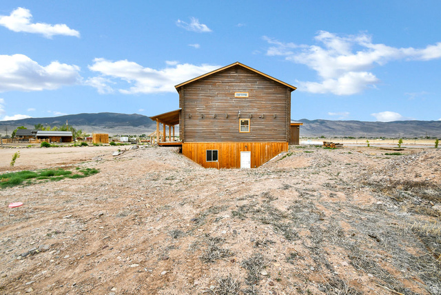 544 East 600 North, Unit 1 Joseph, UT 84739 - Photo 37 of 65 Two-story structure featuring wood plank siding and a pitched roof