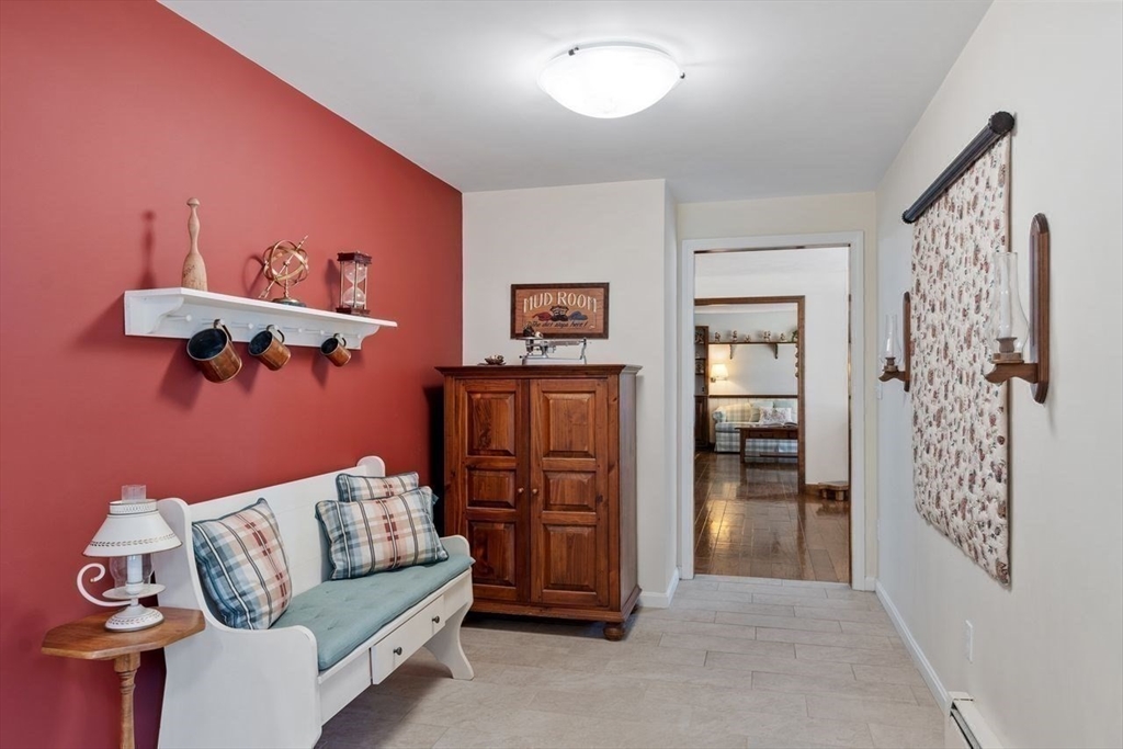 17 Enfield Drive Andover, MA 01810 - Photo 17 of 37 a living room with furniture and wooden floor