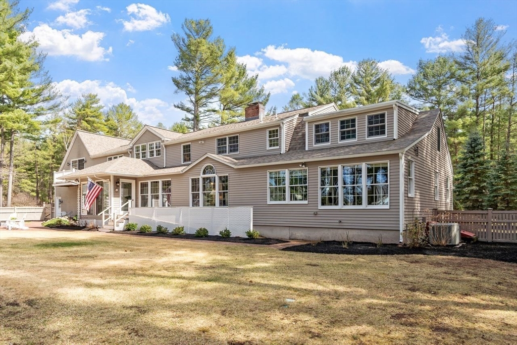 17 Enfield Drive Andover, MA 01810 - Photo 2 of 37 a front view of a house with a yard
