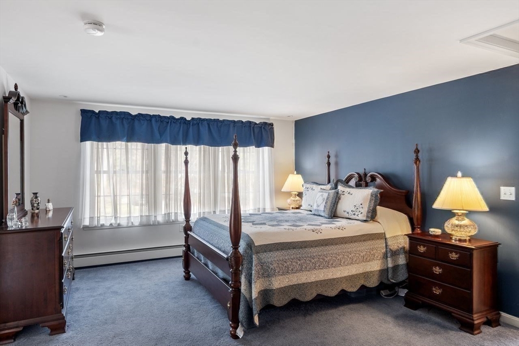 17 Enfield Drive Andover, MA 01810 - Photo 24 of 37 a bedroom with a bed and a window