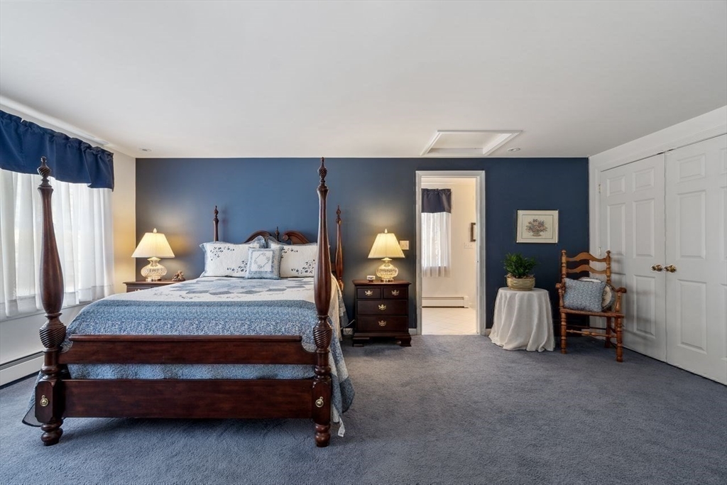 17 Enfield Drive Andover, MA 01810 - Photo 25 of 37 a bedroom with a bed and cabinets