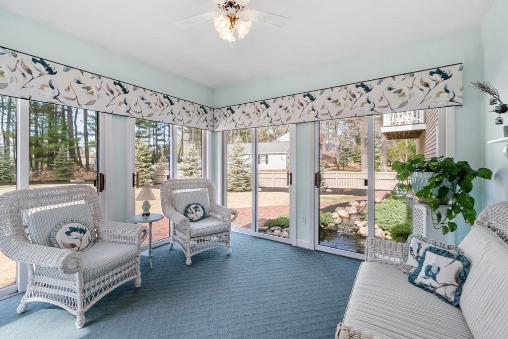 17 Enfield Drive Andover, MA 01810 - Photo 3 of 37 a living room with furniture and a large window