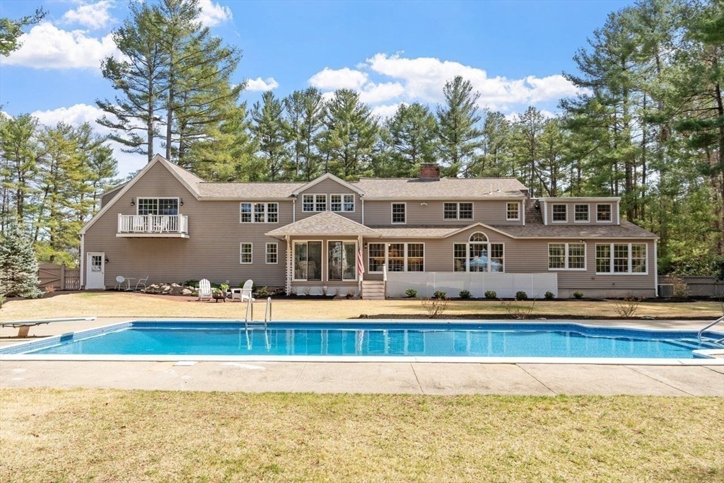 17 Enfield Drive Andover, MA 01810 - Photo 33 of 37 a front view of a house with swimming pool
