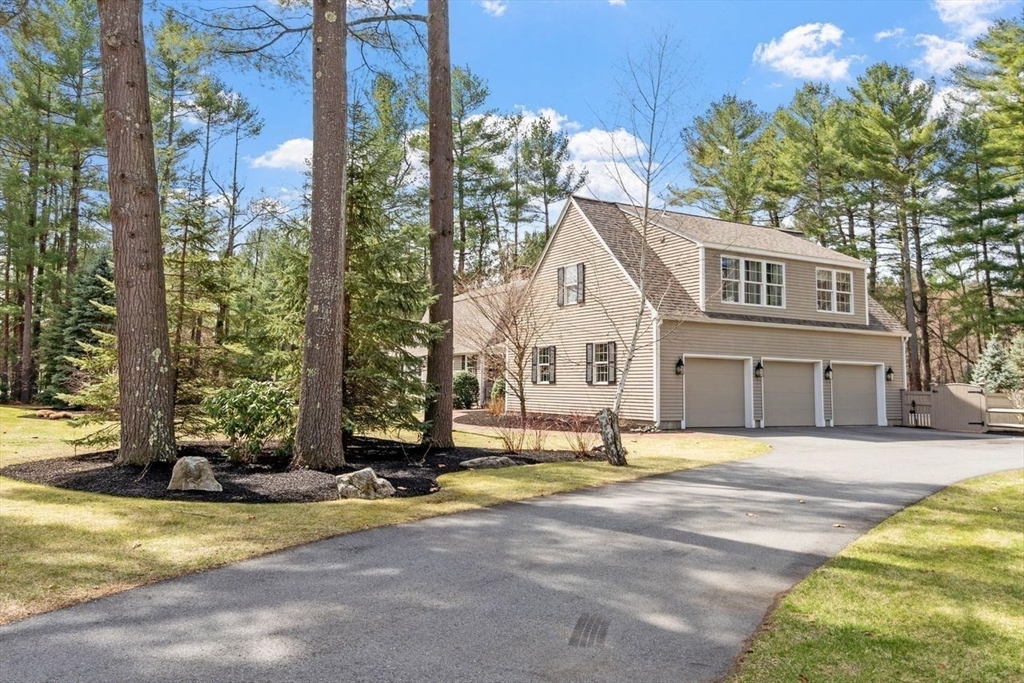 17 Enfield Drive Andover, MA 01810 - Photo 37 of 37 a front view of a house with a yard