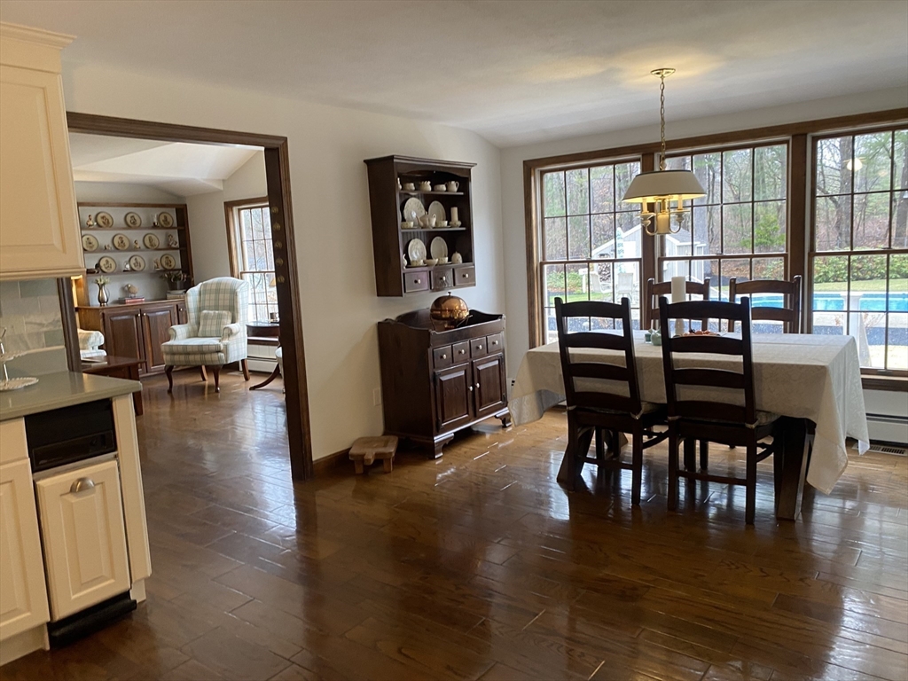 17 Enfield Drive Andover, MA 01810 - Photo 7 of 37 a view of a dining room with furniture window and wooden floor