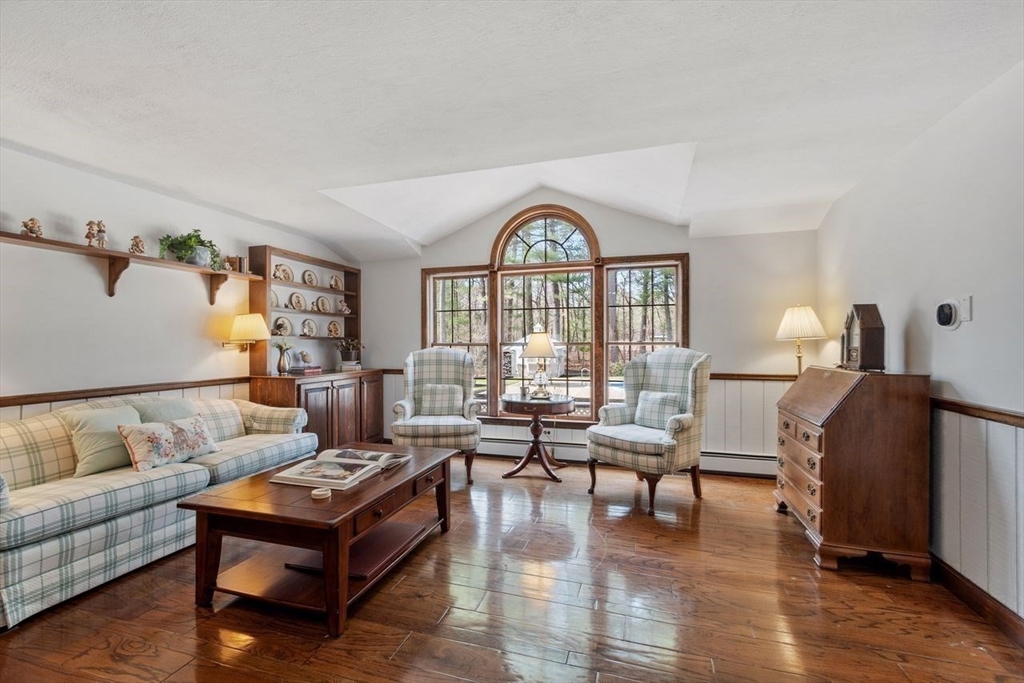 17 Enfield Drive Andover, MA 01810 - Photo 8 of 37 a living room with furniture and a large window