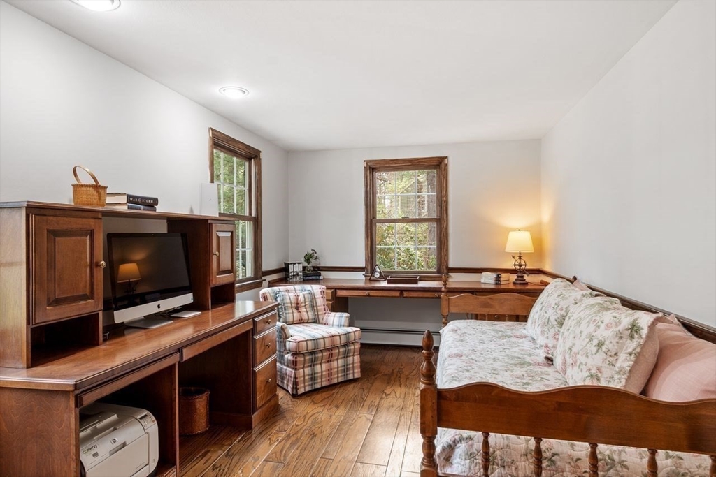 17 Enfield Drive Andover, MA 01810 - Photo 10 of 37 a living room with furniture and a flat screen tv