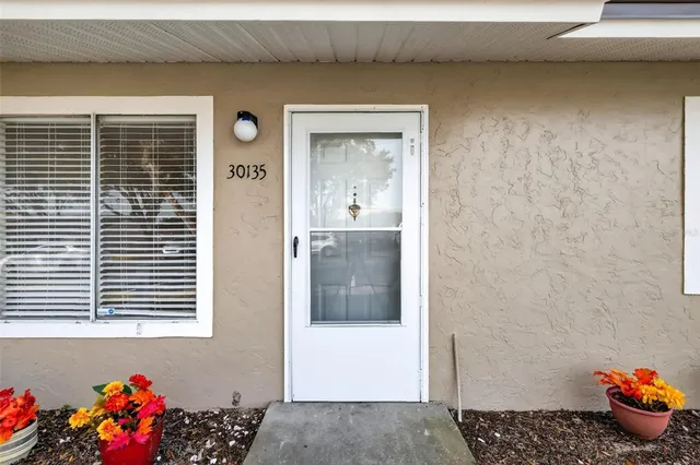 a view of a room that has a bench in it