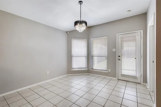 a view of an empty room with window