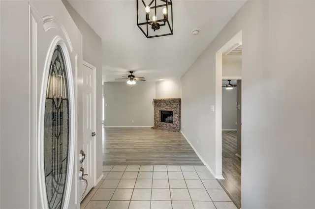 a view of a hallway view with staircase