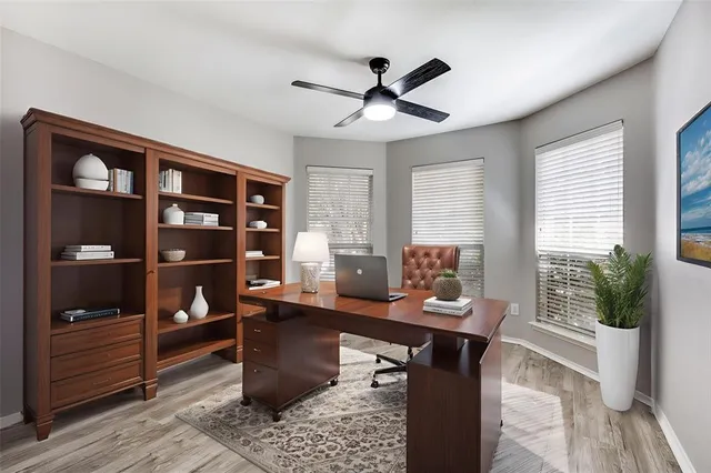 a workspace with furniture and window