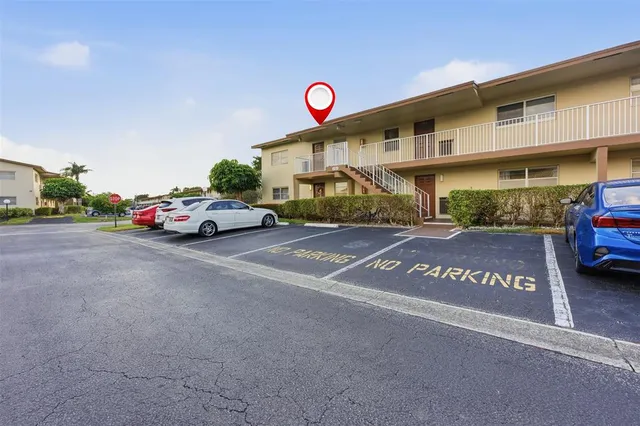 a view of street with parked cars