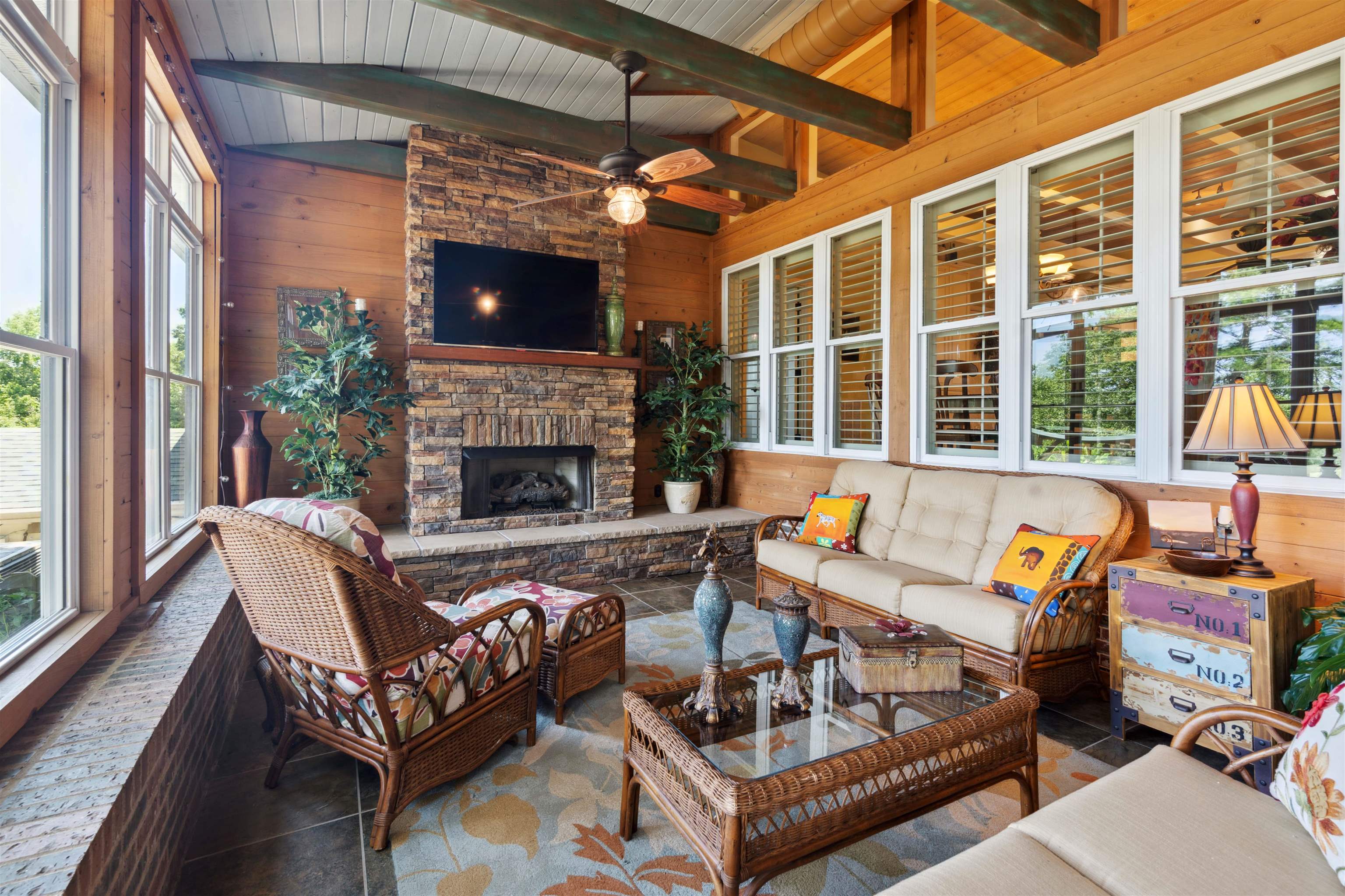 155 Carlins Road Hornsby, TN 38044 - Photo 27 of 40 Sunroom featuring a fireplace, wooden ceiling, vaulted ceiling with beams, and ceiling fan