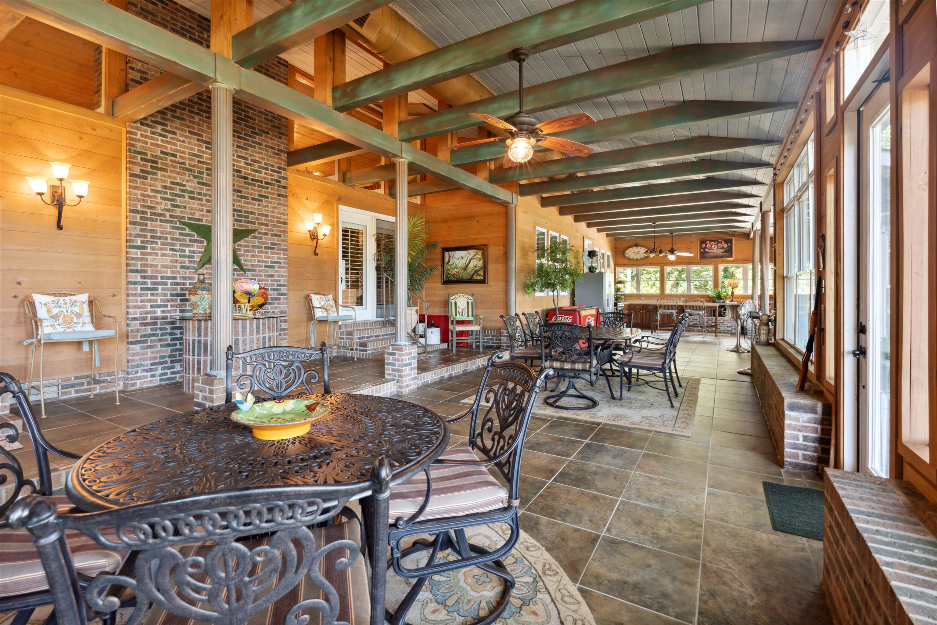 155 Carlins Road Hornsby, TN 38044 - Photo 28 of 40 Sunroom featuring lofted ceiling with beams, ceiling fan, and wood ceiling