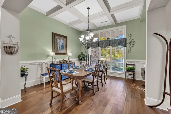a view of a livingroom with furniture and wooden floor