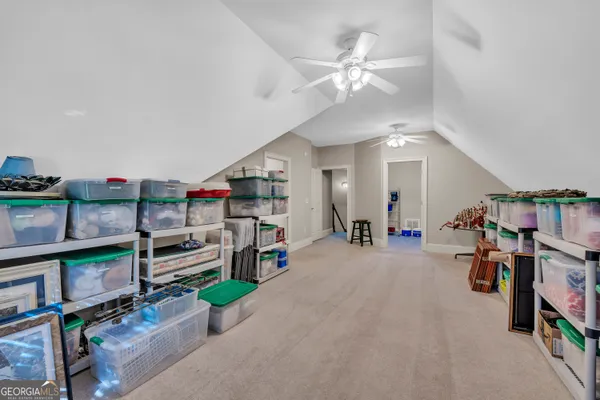 a view of a bathroom from a hallway