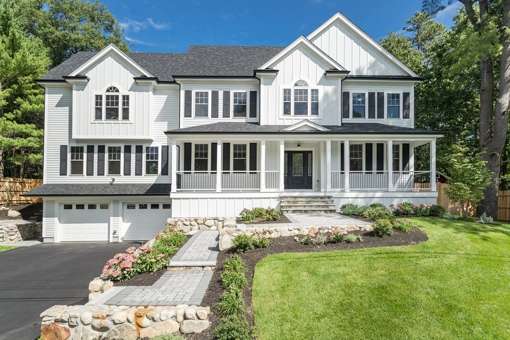 19 Patterson Road Lexington, MA 02421 - Photo 1 of 42 a front view of a house with a garden