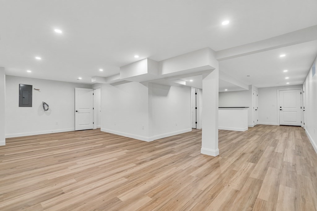 19 Patterson Road Lexington, MA 02421 - Photo 35 of 42 a view of an empty room with wooden floor