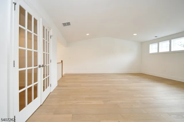 an empty room with windows