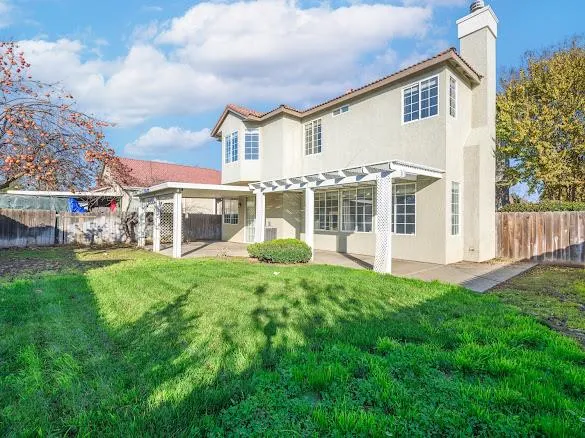 a view of a house with a garden