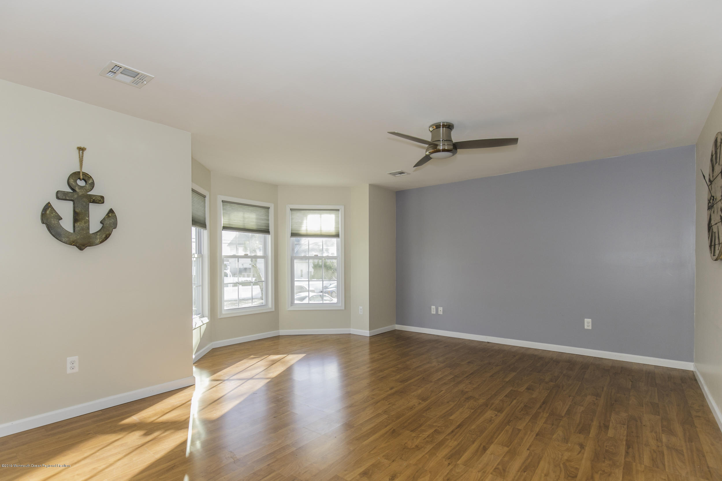 15 Seagoin Road Brick, NJ 08723 - Photo 5 of 32 wooden floor in an empty room with a window
