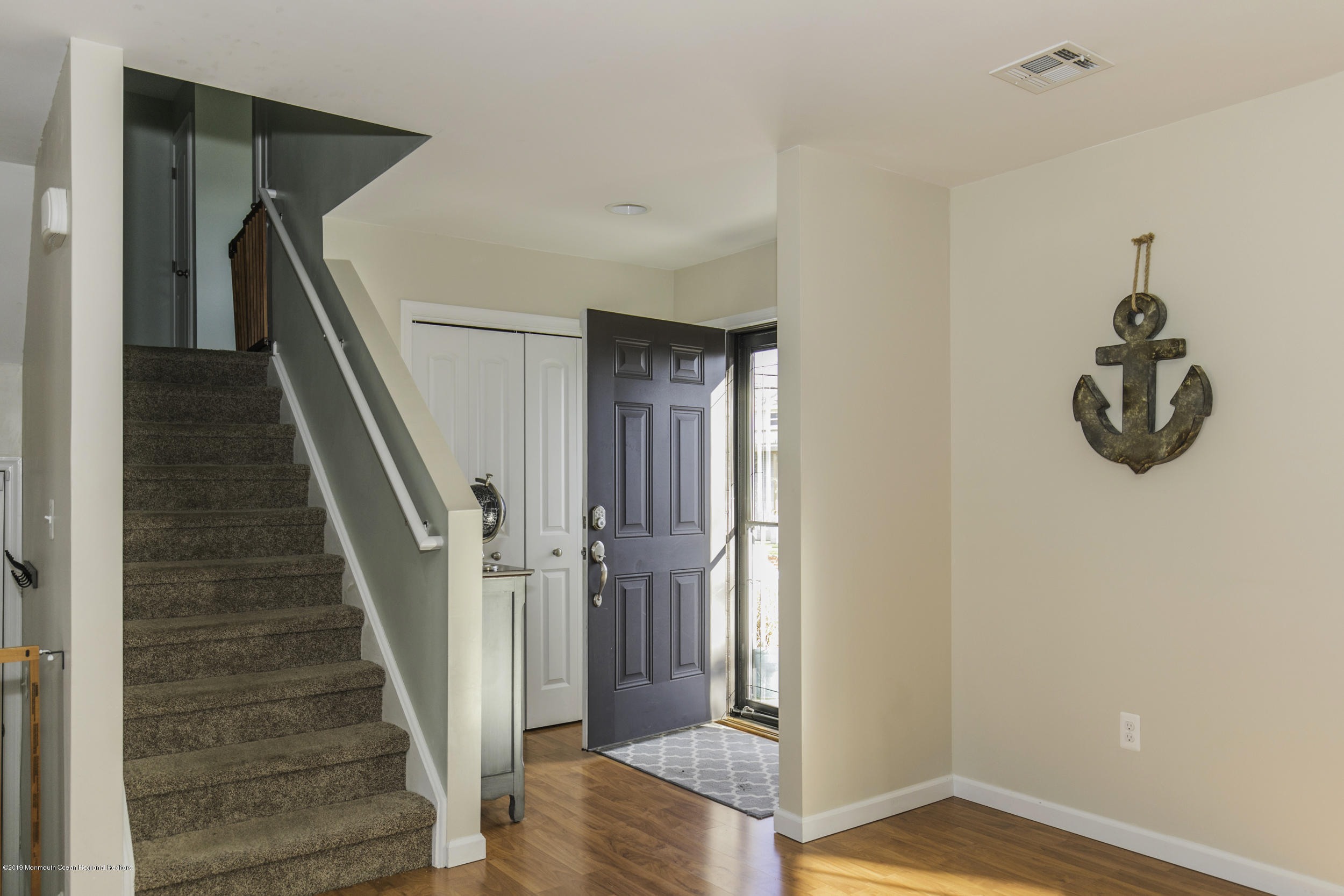 15 Seagoin Road Brick, NJ 08723 - Photo 6 of 32 a view of entryway and hall with wooden floor