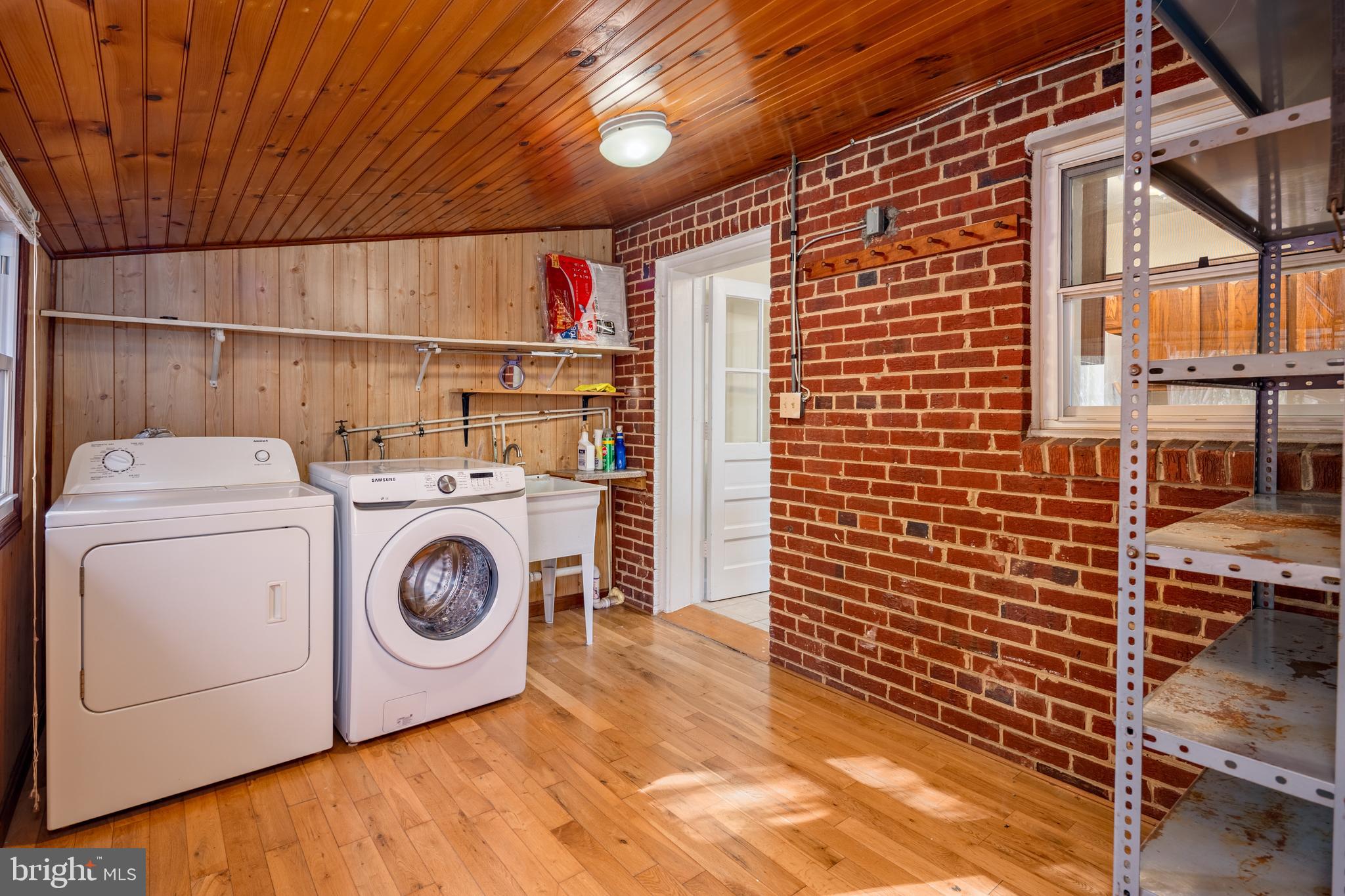 6319 Longfellow Street Riverdale, MD 20737 - Photo 11 of 40 a utility room with dryer and washer