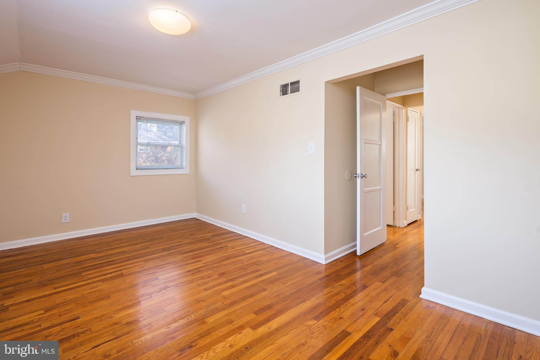 6319 Longfellow Street Riverdale, MD 20737 - Photo 19 of 40 a view of a livingroom with wooden floor