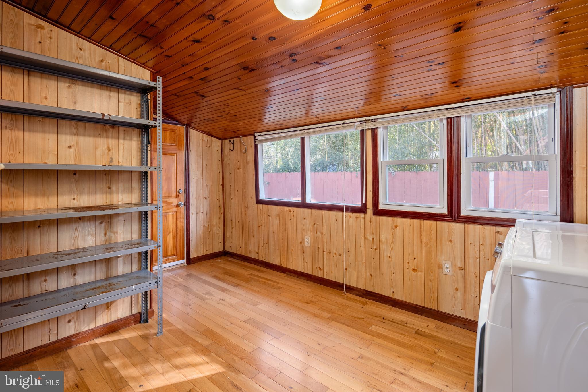 6319 Longfellow Street Riverdale, MD 20737 - Photo 10 of 40 a view of a room with wooden floor and large window