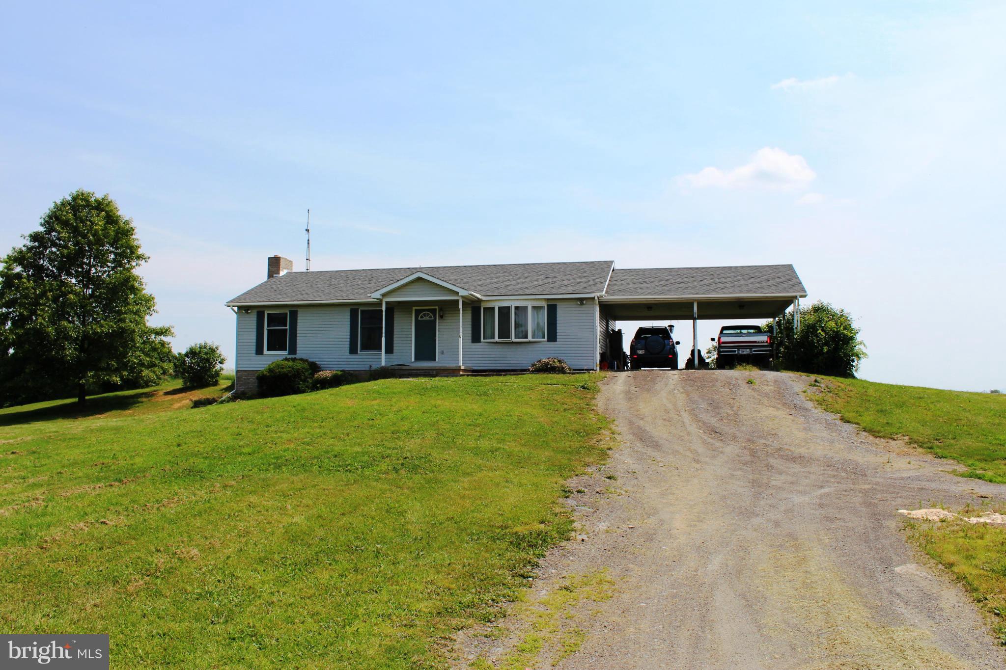 14565 Mercersburg Road Clear Spring, MD 21722 - Photo 2 of 15 a front view of a house with a yard