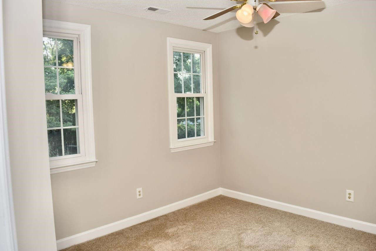 6233 Jones Farm Road Wake Forest, NC 27587 - Photo 16 of 23 Situated on the back of the home, this room overlooks the back yard and deck below. Bedroom 3