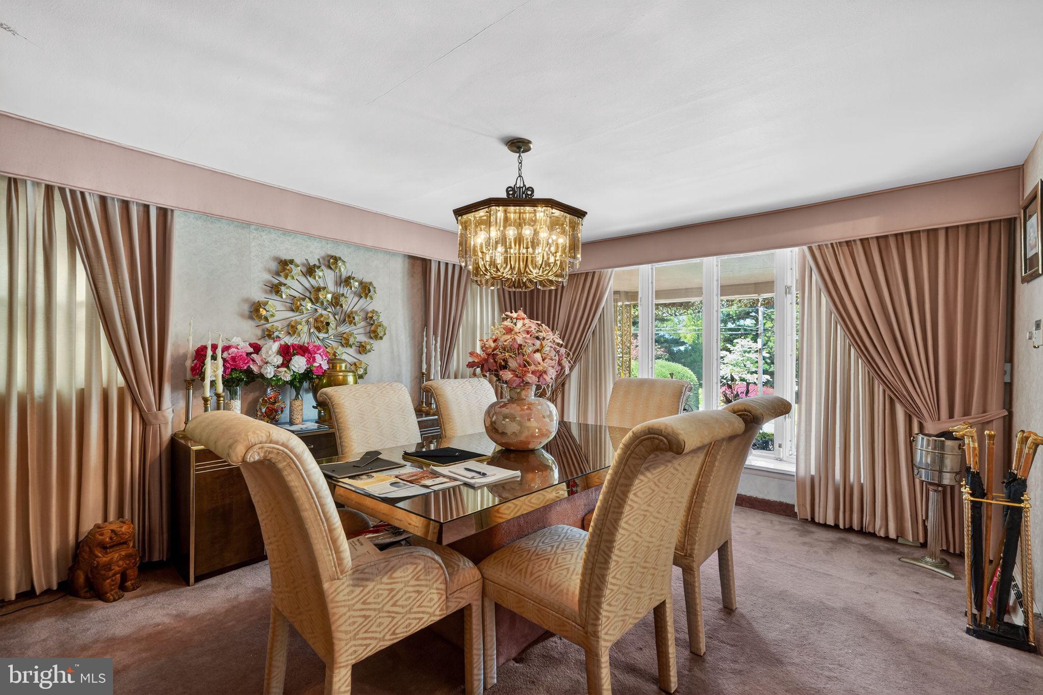 1912 Cobden Road Glenside, PA 19038 - Photo 8 of 30 a dining room with furniture a chandelier and window