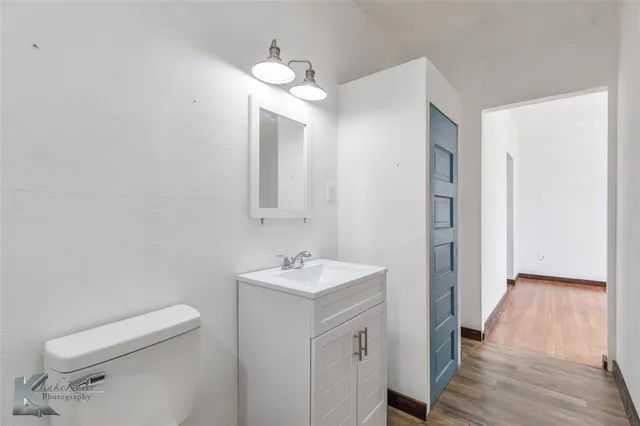 a bathroom with a toilet sink