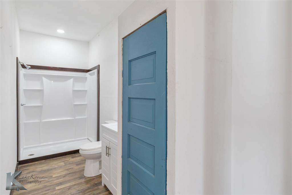 344 Southwest Ave A Hamlin, TX 79520 - Photo 12 of 19 a bathroom with a toilet sink