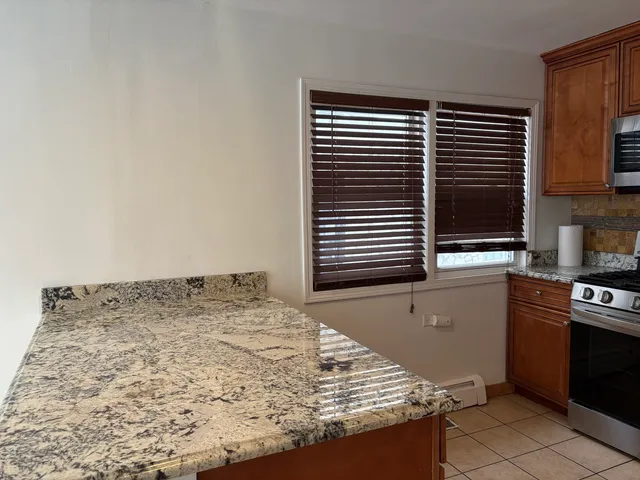 a view of kitchen sink and window